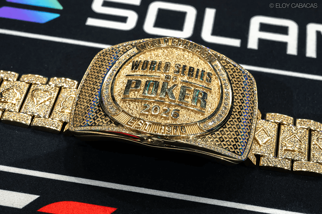 A gold WSOP 2026 bracelet displayed on a poker table.